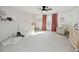 Bright Bedroom with a crib, comfortable chair, and natural light from the window at 512 Stratford Dr, Zebulon, NC 27597