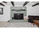 Charming fireplace area with wood-burning stove and views of the Gathering room at 512 Stratford Dr, Zebulon, NC 27597