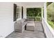Cozy front porch with outdoor seating perfect for relaxing at 512 Stratford Dr, Zebulon, NC 27597