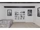 Bright living room with black ceiling beams and custom built-in shelving at 512 Stratford Dr, Zebulon, NC 27597