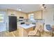 Functional kitchen with a center island, appliances, and abundant cabinet storage at 5319 Memory Ln, Durham, NC 27712