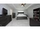 Cozy bedroom featuring a comfortable bed, dresser, ceiling fan, and ample natural light at 621 Childsberg Way, Hillsborough, NC 27278