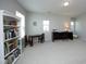 Inviting bonus room with a desk, bookcase, and carpet flooring, offering ample space for study or relaxation at 621 Childsberg Way, Hillsborough, NC 27278