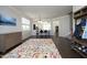 Open-concept living space with modern finishes, hardwood floors, and lots of natural light at 621 Childsberg Way, Hillsborough, NC 27278