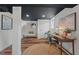 Finished basement with laminate floors, modern furniture, and ample natural light at 623 Massey Ave, Durham, NC 27701