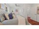 Bright main bedroom with ceiling fan, natural light, and hardwood flooring at 623 Massey Ave, Durham, NC 27701