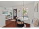Open floor plan view of the entryway, dining area, and living room with stylish decor at 623 Massey Ave, Durham, NC 27701