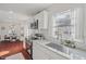 Updated kitchen with stainless steel appliances and convenient breakfast nook dining area at 623 Massey Ave, Durham, NC 27701