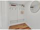 Mudroom features built-in storage with hooks and shelves at 623 Massey Ave, Durham, NC 27701