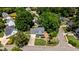 Aerial view of a well-maintained property with manicured landscaping and a spacious driveway at 6509 Virgilia Ct, Raleigh, NC 27616