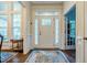 Elegant foyer with hardwood floors and a decorative rug at 67 Crimson Way, Pittsboro, NC 27312