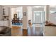 Open concept view of the foyer leading to the dining room with hardwood floors at 67 Crimson Way, Pittsboro, NC 27312