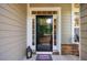 A close up of the front door and entry way of a cozy home at 67 Crimson Way, Pittsboro, NC 27312
