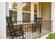 Inviting front porch with rocking chairs to sit and relax on a lazy day at 67 Crimson Way, Pittsboro, NC 27312