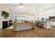 Spacious living room featuring a fireplace, hardwood floors, and lots of natural light at 67 Crimson Way, Pittsboro, NC 27312