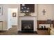 Living room with fireplace, TV, and an adjacent doorway at 67 Crimson Way, Pittsboro, NC 27312