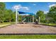 Bright and fun community playground with swings, slide, and climbing structure for to enjoy outdoor play at 67 Crimson Way, Pittsboro, NC 27312