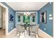 Charming dining room with stylish chandelier, bay window, and modern decor at 6820 Chamonix Pl, Raleigh, NC 27613