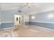 Neutral living room boasts neutral walls, vaulted ceiling, and a front entrance at 6820 Chamonix Pl, Raleigh, NC 27613