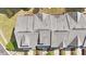 Aerial view showing roof line and chimneys of townhomes surrounded by green landscaping at 710 Samuel Cary Dr, Cary, NC 27511