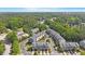 Aerial view of townhomes in a wooded community at 710 Samuel Cary Dr, Cary, NC 27511
