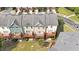 View of townhomes showing wooden decks with furniture at 710 Samuel Cary Dr, Cary, NC 27511