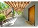 Outdoor patio with concrete flooring and views of the surrounding greenery at 7723 Johnson Mill Rd, Bahama, NC 27503
