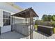 Backyard featuring a covered hot tub perfect for relaxation and outdoor enjoyment at 79 Blande Dr, Kenly, NC 27542