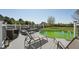Backyard features a deck with furniture and an above ground pool for outdoor enjoyment at 79 Blande Dr, Kenly, NC 27542