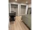Well-lit bedroom with large closet and a dedicated workspace, offering a perfect blend of relaxation and productivity at 807 W Trinity Ave # 144, Durham, NC 27701