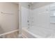 Clean bathroom with a white tiled shower and tub at 809 Amarillo Rose Ln, Durham, NC 27712