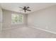 Bright and airy bedroom featuring a large window and neutral decor at 809 Amarillo Rose Ln, Durham, NC 27712