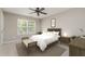 Comfortable bedroom with ample natural light and tasteful decor at 809 Amarillo Rose Ln, Durham, NC 27712