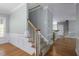 Spacious entryway with hardwood floors and a staircase leading to the upper level at 815 Carpenter Town Ln, Cary, NC 27519