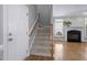 Hallway view with stairs leading to the second floor at 815 Carpenter Town Ln, Cary, NC 27519