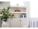 Built-in shelves with decor in a living room setting at 92 Cardinal Ridge Rd, Chapel Hill, NC 27516