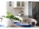 Kitchen featuring granite countertops, stainless steel refrigerator, and decorative skeleton at 92 Cardinal Ridge Rd, Chapel Hill, NC 27516