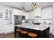 Stylish kitchen with white cabinets, granite countertops, stainless steel appliances, and an island at 92 Cardinal Ridge Rd, Chapel Hill, NC 27516