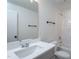 Bathroom boasts sink vanity, ample counter space, and a tub-shower combo at Lot 3260 Yorkshire Cir, Sanford, NC 27332