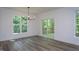 Bright dining area with sliding doors out to deck and large windows that offer abundant natural light at Lot 3260 Yorkshire Cir, Sanford, NC 27332