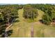 Beautiful golf course with mature trees and a winding cart path at Lot 3260 Yorkshire Cir, Sanford, NC 27332