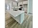 Spacious kitchen with a large island, white cabinets, stainless appliances, and modern finishes at Lot 3260 Yorkshire Cir, Sanford, NC 27332
