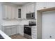 Well-appointed kitchen with white subway tile backsplash, stainless steel appliances, and ample cabinetry at Lot 3260 Yorkshire Cir, Sanford, NC 27332