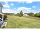 Well-maintained backyard featuring a lush green lawn and perimeter fence at 10 Princeton Manor Dr, Youngsville, NC 27596