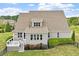 Charming home with a well-maintained yard, a deck, and mature landscaping providing a private and serene outdoor space at 10 Princeton Manor Dr, Youngsville, NC 27596