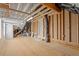 Unfinished basement featuring ceiling beams, exposed ductwork, and vapor barrier at 10 Princeton Manor Dr, Youngsville, NC 27596