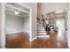 Open foyer showcasing hardwood floors and staircase at 10 Princeton Manor Dr, Youngsville, NC 27596