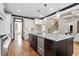Modern kitchen with granite countertops, stainless appliances, and custom cabinetry at 10 Princeton Manor Dr, Youngsville, NC 27596