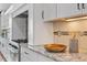 Modern kitchen with sleek appliances and granite countertops at 10 Princeton Manor Dr, Youngsville, NC 27596