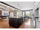 Spacious kitchen with island, granite counters, and views to living room and breakfast nook at 10 Princeton Manor Dr, Youngsville, NC 27596